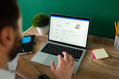 A laptop with an open resume template